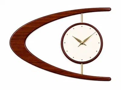 A midcentury modern style wooden wall clock.